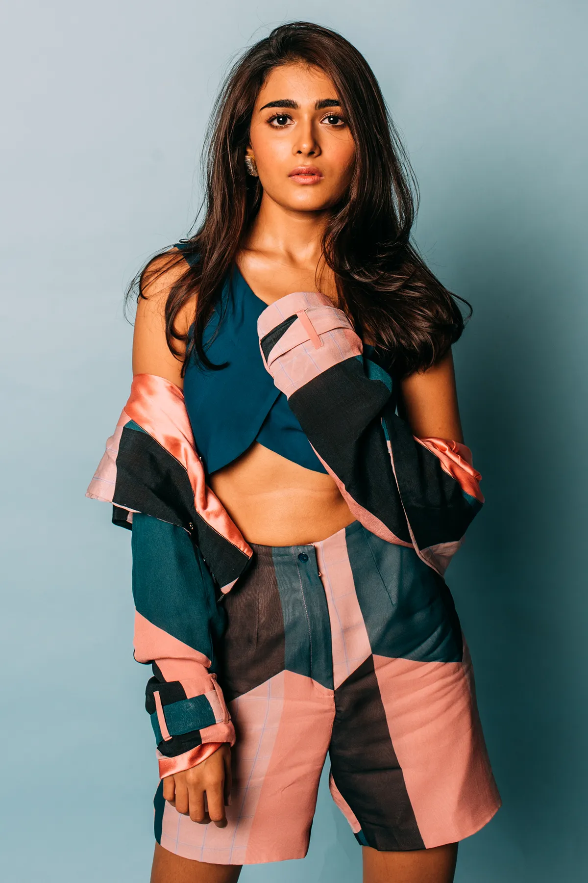 Shalini Pandey in One-shouldered Merino Suiting Teal Top and Short Printed Crepe Jacket and Shorts